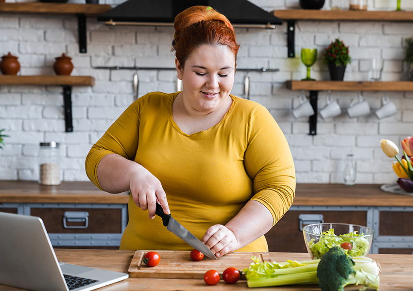 Woman cooking at home
