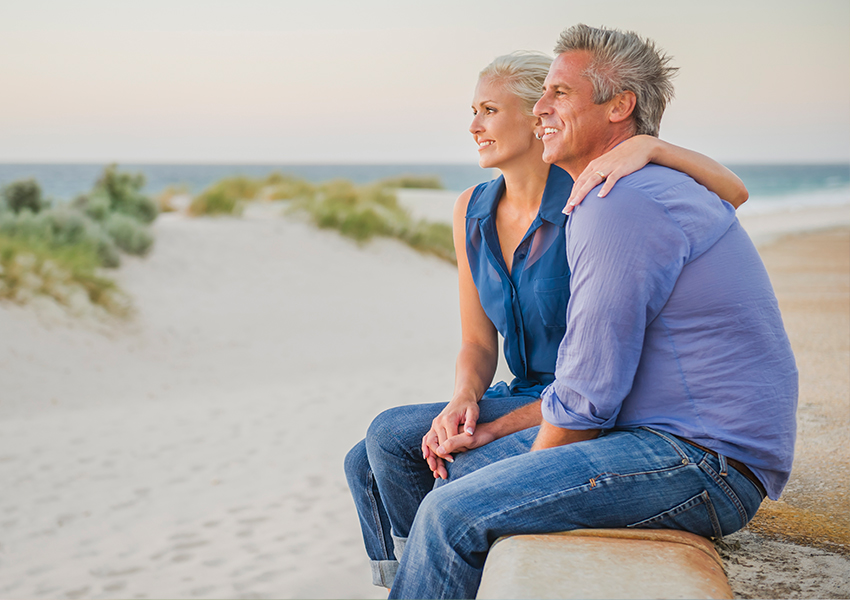 Happy couple on the beach